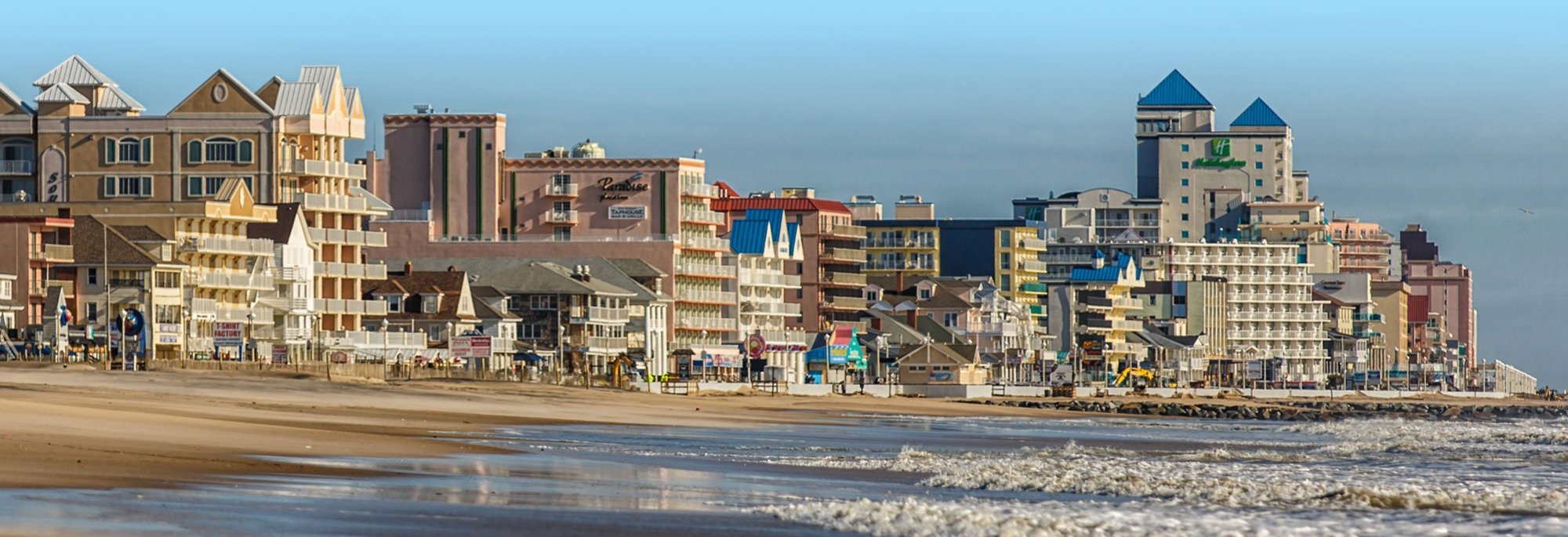 view from shoreline of ocean city boardwalk and hotels